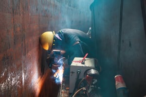 Workers in a confined space