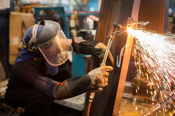 welder wearing a faceshield